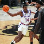 Council’s late scoring helps No. 19 Kansas beat Colorado 75-69 win with Bill Self missing from bench