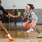 Busters Break Through: Garden City Tops Cowley 62–58