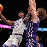 Peterson scores 24 to lead No. 14 Kansas past TCU 78-73 in the Big 12 quarterfinals