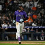 Rockies score 8 runs in the fifth inning and beat the Astros 9-7