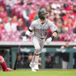 Goodman hits 2 HRs, Sugano pitches 5 1/3 scoreless innings, Rockies beat Reds 13-2